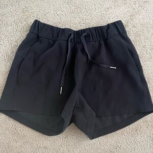 Black Lululemon high rise drawstring shorts size 4
